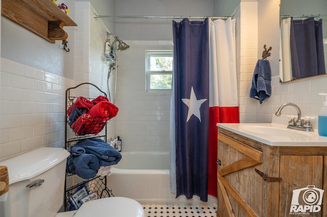 full bathroom featuring tasteful backsplash, tile walls, vanity, shower / tub combo, and toilet