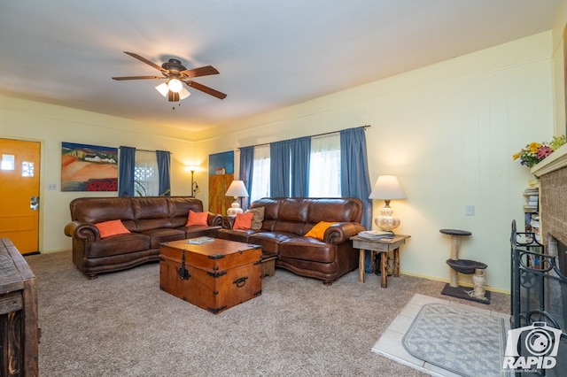 living room with light carpet and ceiling fan