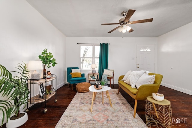 interior space with dark wood-type flooring, a textured ceiling, and ceiling fan