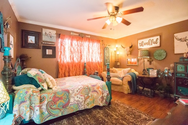 bedroom with ceiling fan, ornamental molding, and wood finished floors