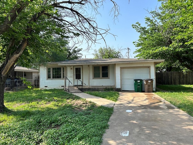 ranch-style house featuring concrete driveway, a front lawn, an attached garage, and fence