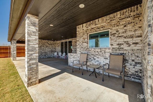 view of patio with fence