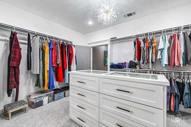 walk in closet featuring carpet floors and visible vents