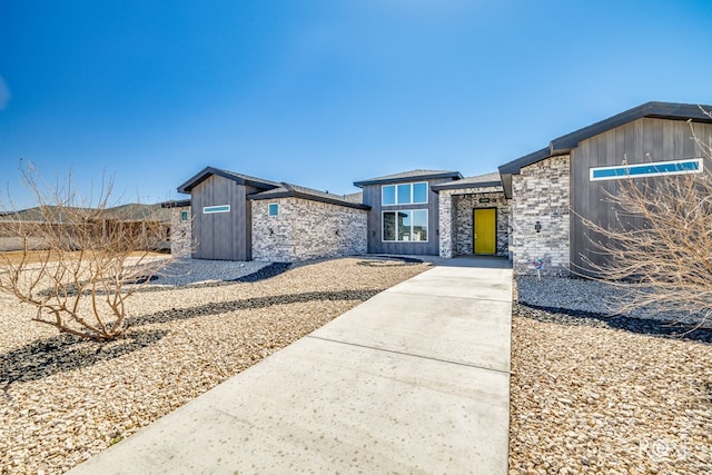 view of front of home featuring stone siding