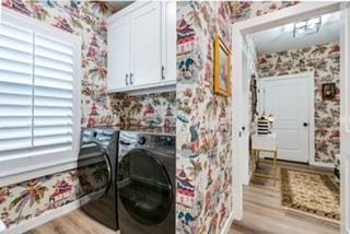 clothes washing area with washer and clothes dryer, light hardwood / wood-style floors, and cabinets