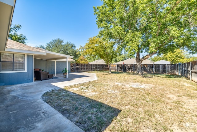 view of yard with a patio area