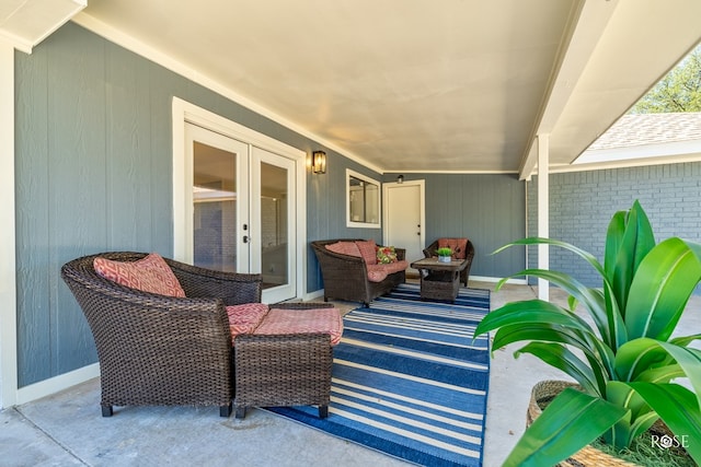 view of patio / terrace with french doors and an outdoor living space