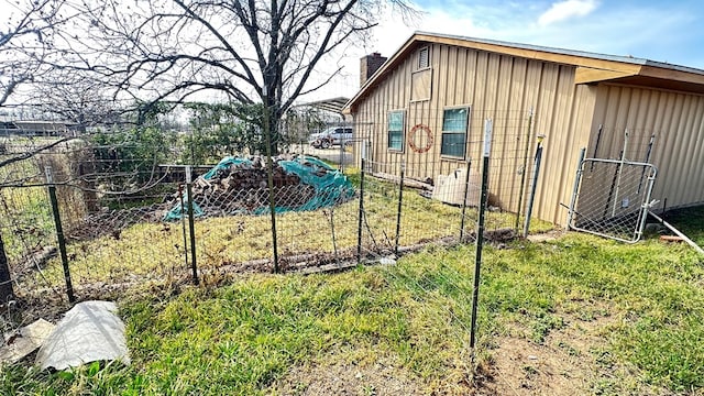 exterior space with a chimney and fence