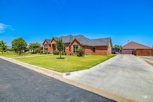 4710 Shadow Crk, San Angelo, TX 76904 - view of front of home with driveway and brick siding