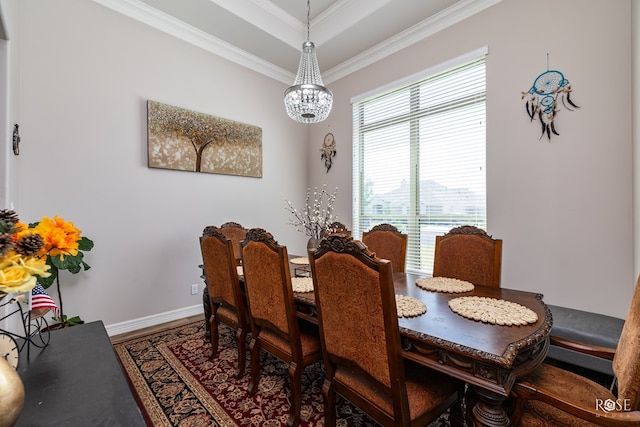 4710 Shadow Crk, San Angelo, TX 76904 - dining space with crown molding, baseboards, wood finished floors, and a raised ceiling