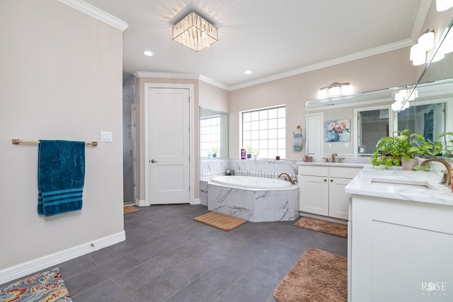 4710 Shadow Crk, San Angelo, TX 76904 - full bath featuring two vanities, crown molding, a bath, a chandelier, and baseboards