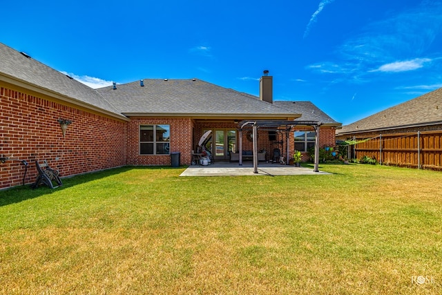 4710 Shadow Crk, San Angelo, TX 76904 - rear view of house featuring a chimney, brick siding, a patio, and roof with shingles