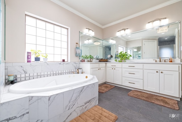 4710 Shadow Crk, San Angelo, TX 76904 - full bath with healthy amount of natural light, a garden tub, ornamental molding, vanity, and tile patterned flooring