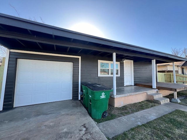 exterior space with a garage and driveway