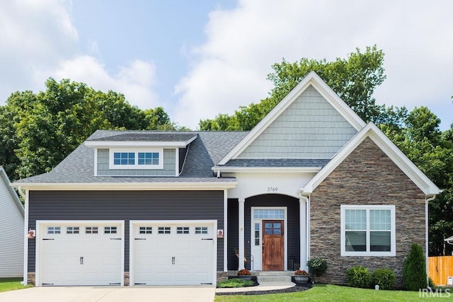 craftsman-style home with a garage