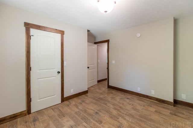 unfurnished bedroom with light hardwood / wood-style floors