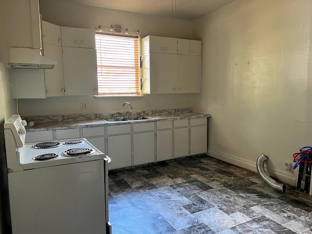 kitchen featuring white cabinets, dark tile floors, sink, and electric range