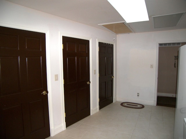 foyer with light tile floors