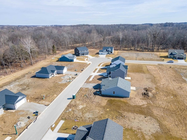 bird's eye view featuring a view of trees