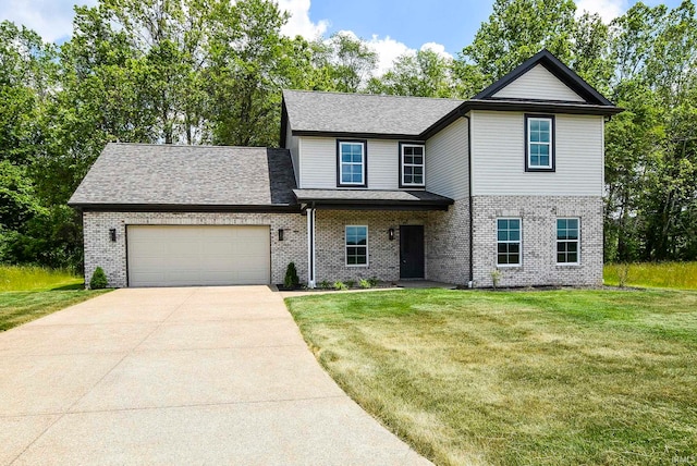 view of property with a front yard and a garage