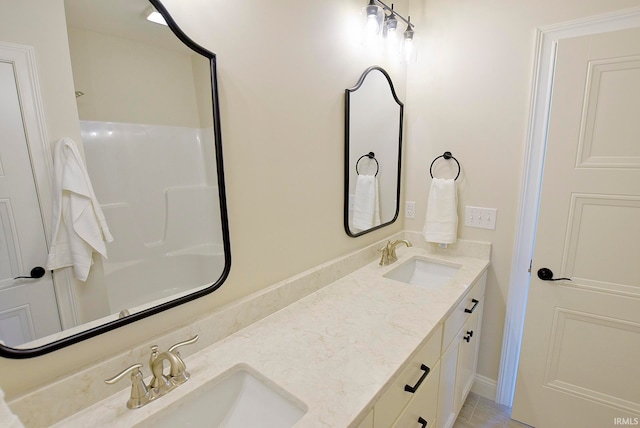 bathroom featuring double vanity