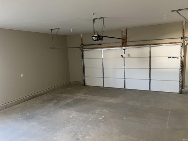 garage featuring a garage door opener