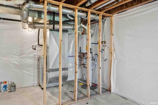 1114 Beacon Dr, Mishawaka, IN 46544 - unfinished below grade area featuring tankless water heater and heating unit