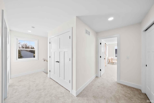 1114 Beacon Dr, Mishawaka, IN 46544 - hall with carpet flooring, baseboards, and visible vents