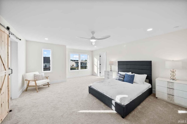 1114 Beacon Dr, Mishawaka, IN 46544 - carpeted bedroom with recessed lighting, a barn door, baseboards, and ceiling fan