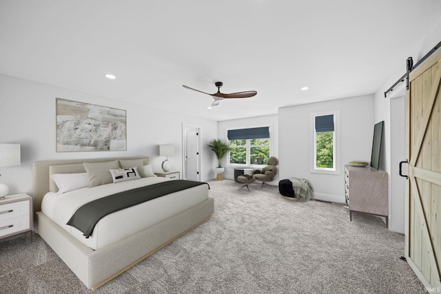 1114 Beacon Dr, Mishawaka, IN 46544 - carpeted bedroom featuring recessed lighting, baseboards, a ceiling fan, and a barn door