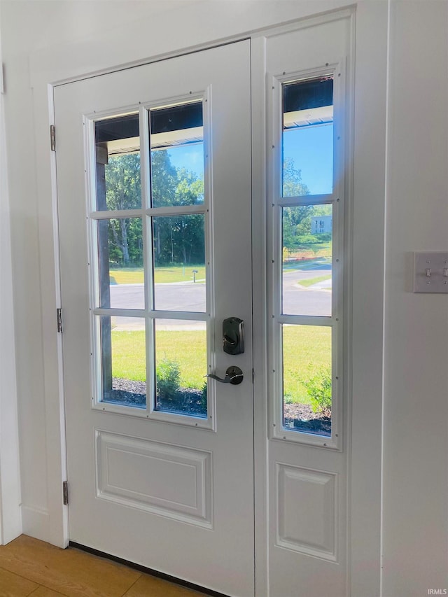 doorway to outside with plenty of natural light