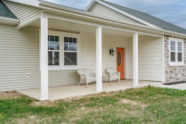 property entrance featuring a porch