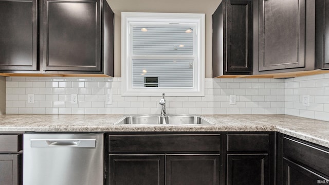 kitchen featuring tasteful backsplash, dishwasher, dark brown cabinets, and sink