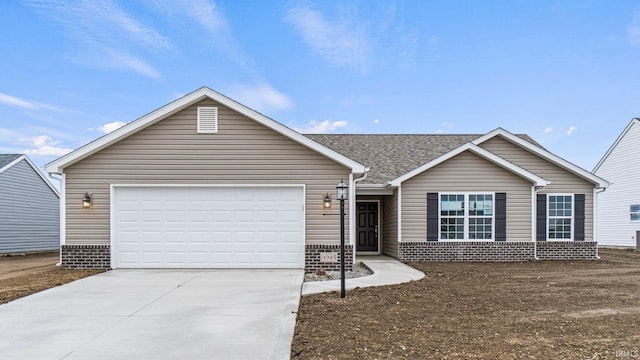 ranch-style house featuring a garage