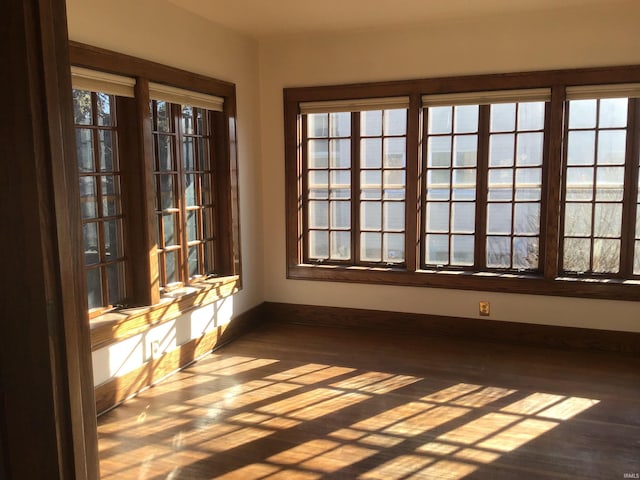 unfurnished sunroom featuring plenty of natural light