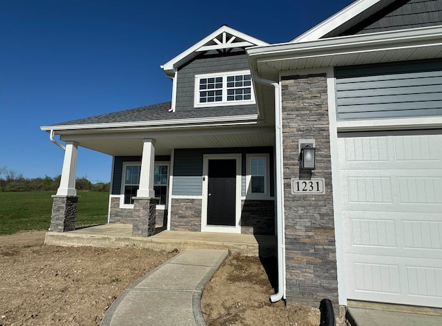 doorway to property featuring covered porch