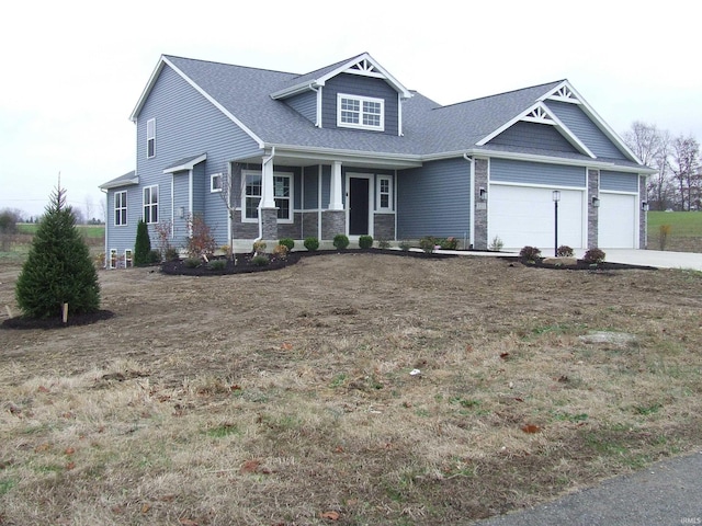 craftsman-style house with a porch and a garage