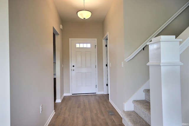 doorway to outside featuring hardwood / wood-style flooring