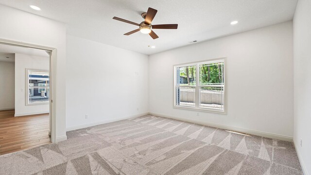 002 Ln 520 Lake James Unit 2, Fremont, IN 46737 - unfurnished room featuring carpet flooring, a ceiling fan, baseboards, and recessed lighting