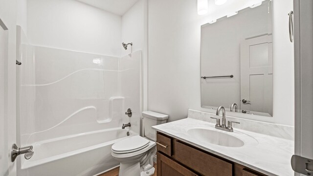 002 Ln 520 Lake James Unit 2, Fremont, IN 46737 - bathroom with toilet, vanity, and washtub / shower combination