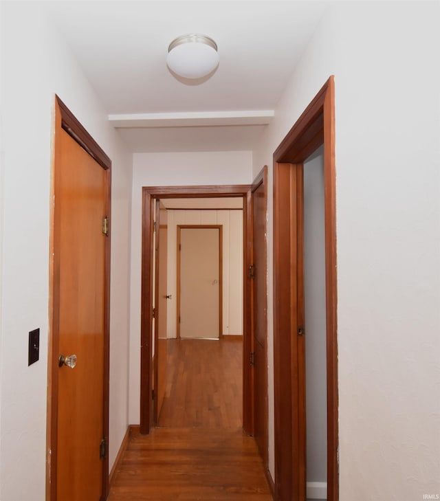 hallway featuring hardwood / wood-style floors