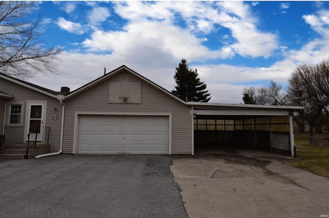 garage with a carport