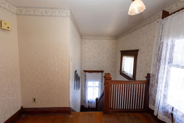 spare room with wood-type flooring