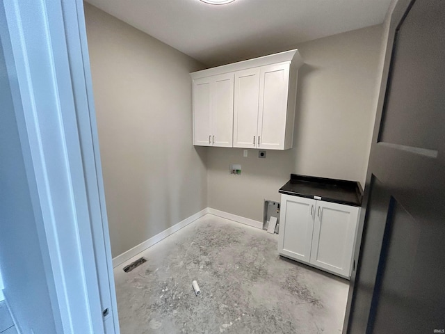 laundry area with cabinets, washer hookup, and hookup for an electric dryer