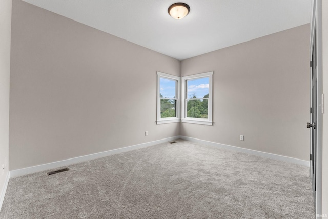 view of carpeted spare room