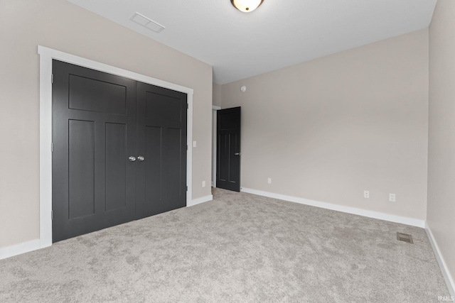 unfurnished bedroom featuring carpet floors