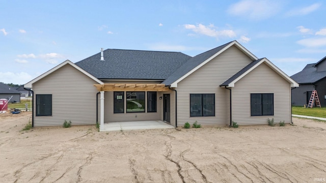 back of house featuring a pergola and a patio area