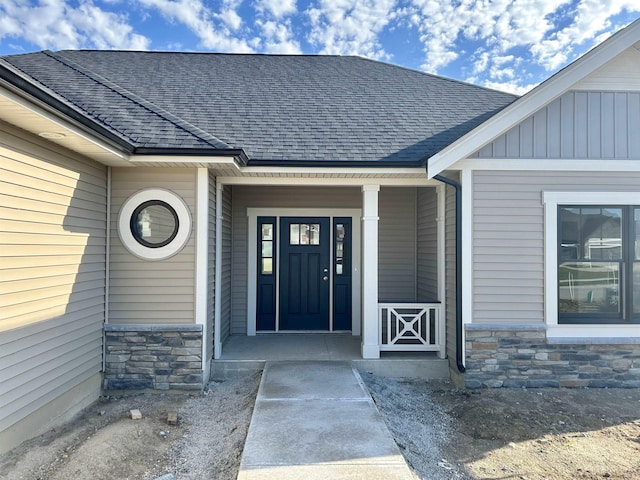 doorway to property featuring a porch