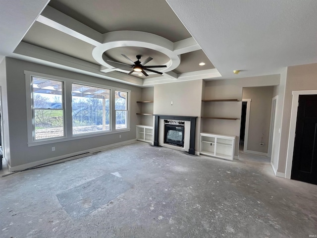 unfurnished living room featuring coffered ceiling and ceiling fan