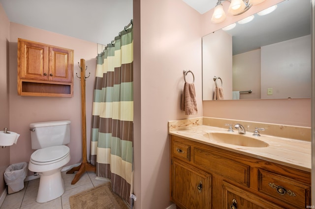 bathroom with a shower with curtain, tile patterned flooring, vanity, and toilet